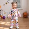 imageKuriozud Kids Toddler Girl Halloween Pajamas Fuzzy Trim Long Sleeve Button Down Shirt Top and Pants 2pcs Pjs Sets SleepwearFloral Pumpkin Bat Apricot